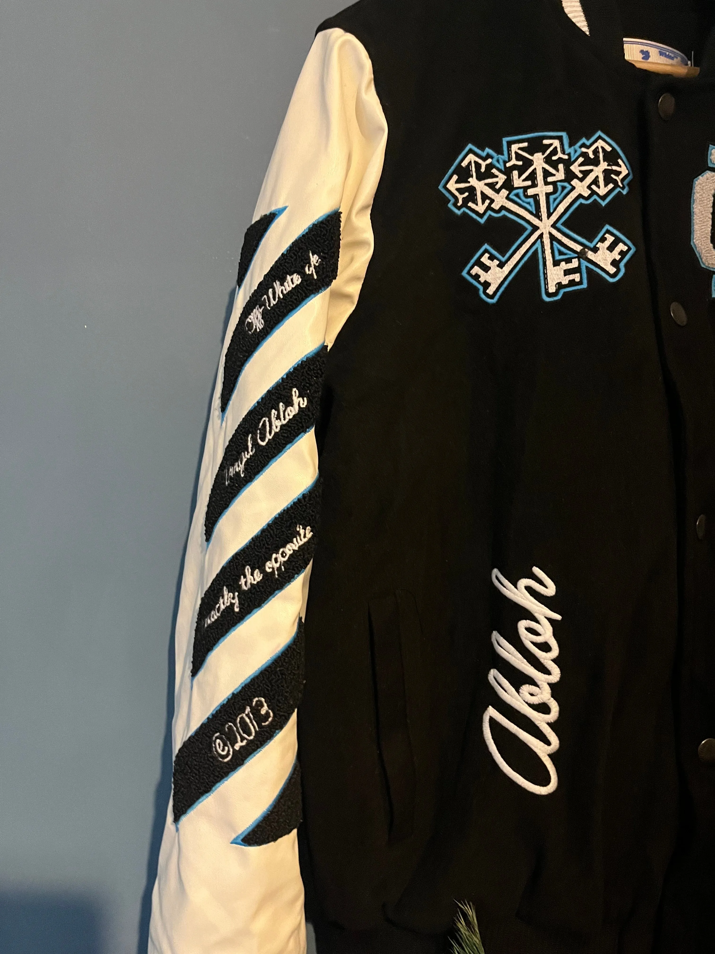 Off-White "Logo-Patch Varsity" Jacket styled in Black for Fall&Winter 2024